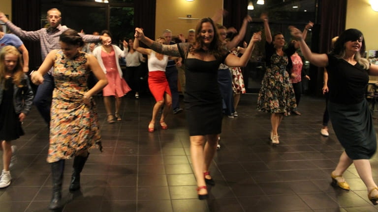 The Long Island Swing Syndicate offers dance lessons and hosts...