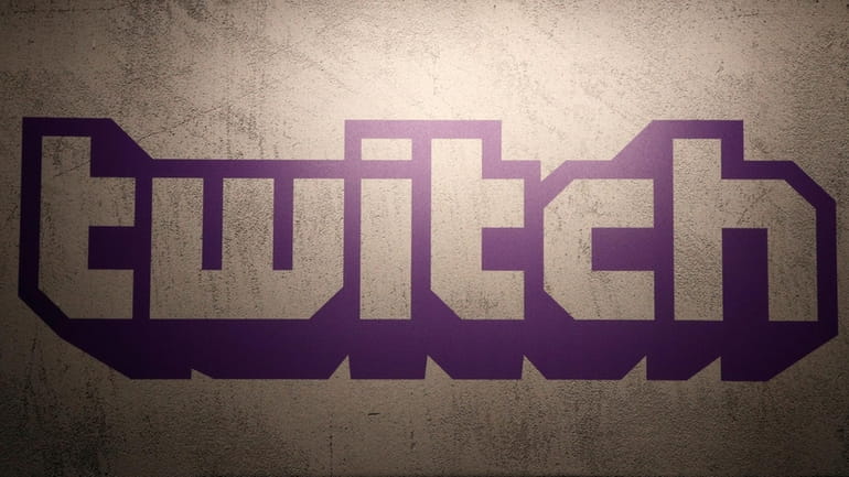 The logo for live-streaming video platform Twitch is seen on...