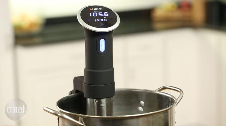 Anova Precision Cooker Bluetooth + Wi-Fi involves submerging sealed meat or...