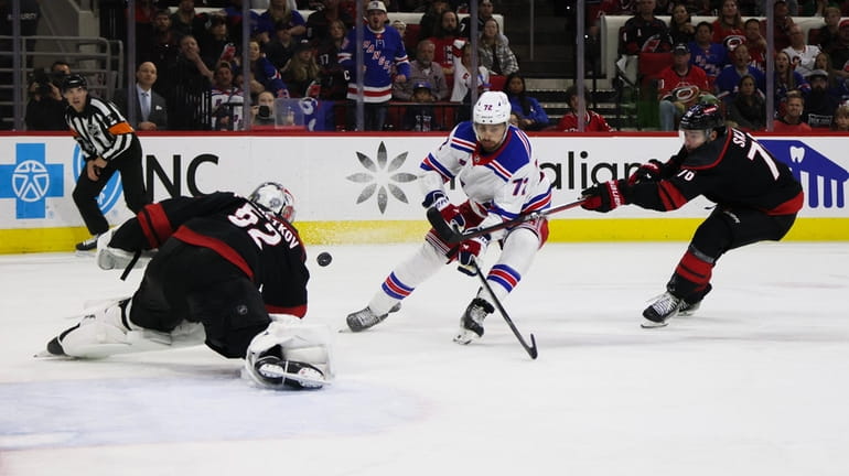 Filip Chytil #72 of the Rangers shoots the puck against Pyotr...