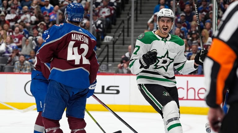 Dallas Stars left wing Mason Marchment, right, reacts after a...