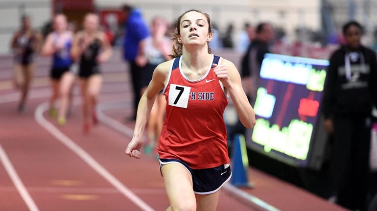 South Side's Olivia Duca wins the 3,000 meters with a time of...