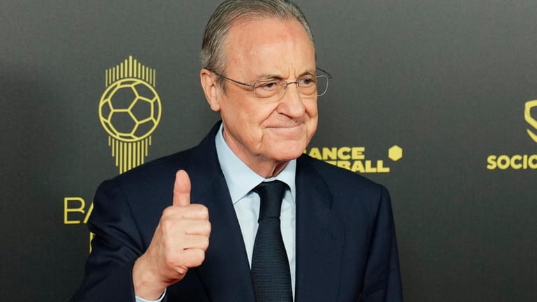 Real Madrid president Florentino Perez poses for a picture prior...