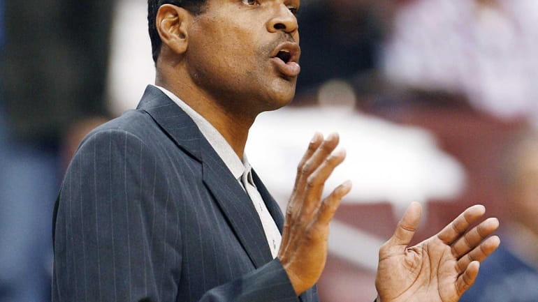 Then-Philadelphia 76ers coach Maurice Cheeks calls instructions to his players...