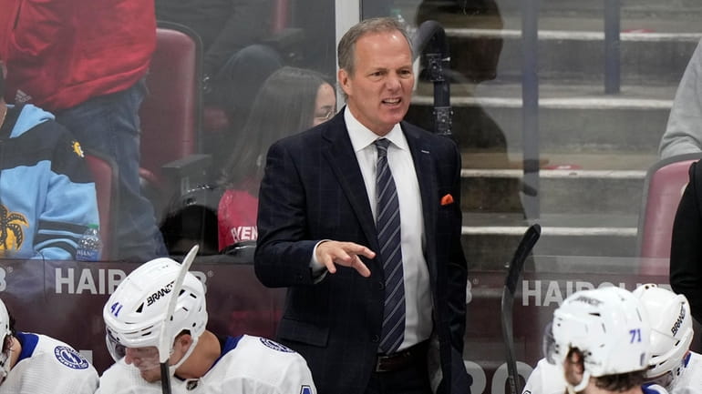 Tampa Bay Lightning head coach Jon Cooper calls out to...