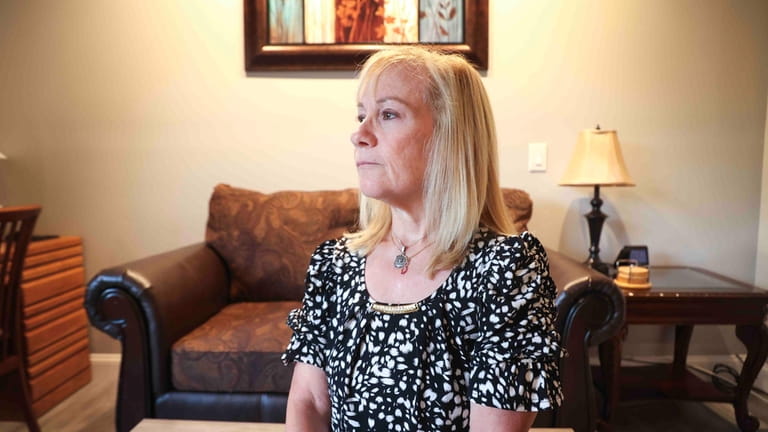 Lisa Hollander, 60, of Medford paid off her undergraduate loans...
