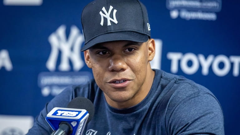 Yankees’ Juan Soto speaks at a news conference during spring training...