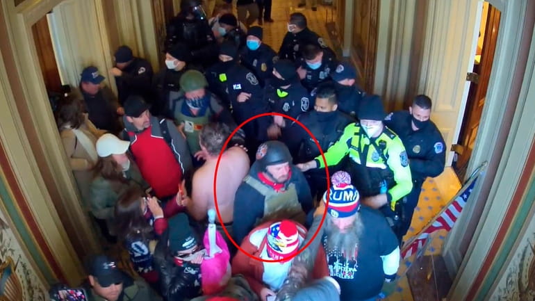 This image from U.S. Capitol Police security video and contained...