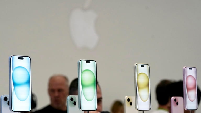 The iPhone 15 phones are shown during an announcement of...