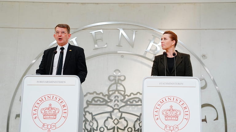 Danish Prime Minister Mette Frederiksen, right, and Deputy Prime Minister...