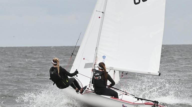Young sailors practice for this weekend's regatta race in the waters off...
