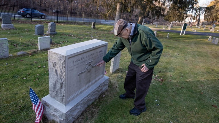 Robert Farrell at the grave of Civil War veteran Robert...