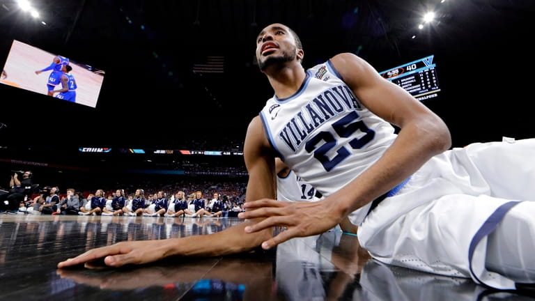 Villanova guard Mikal Bridges watches from the bench during the...