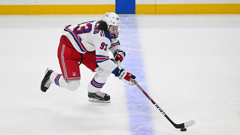 Mika Zibanejad of the New York Rangers skates with the...