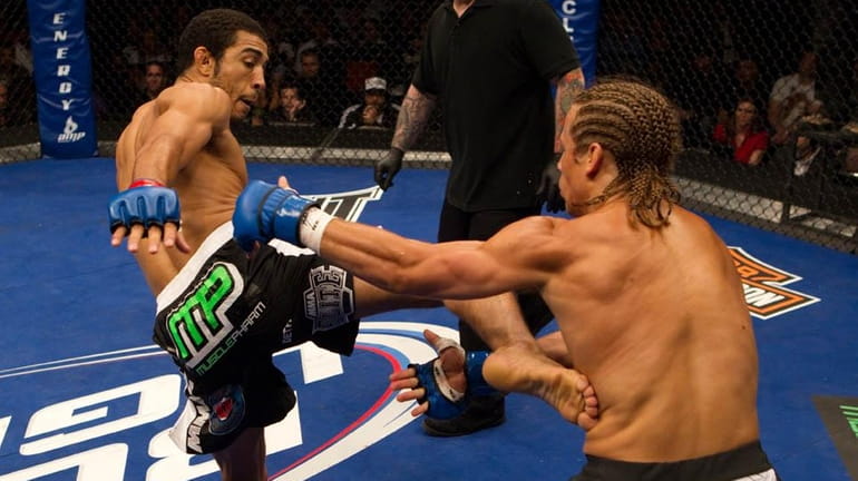 Jose Aldo, left, defended his featherweight title with a five-round...