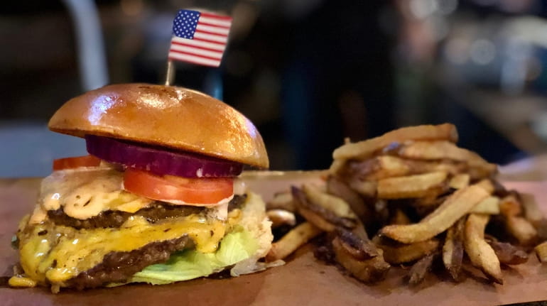 The all-American burger at Publicans, which has reopened in Manhasset.
