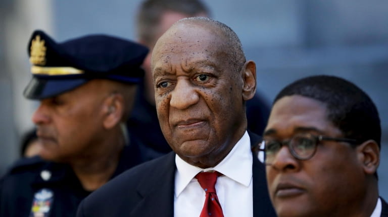  In this April 26, 2018 file photo, Bill Cosby, center,...