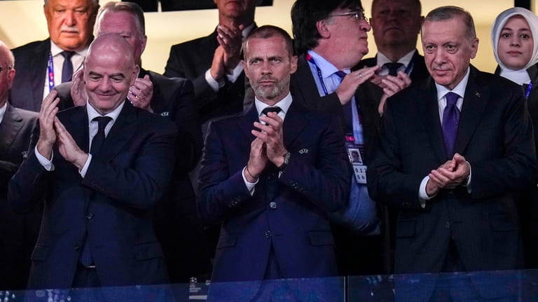 From left, FIFA President Gianni Infantino, UEFA president Aleksander Ceferin,...