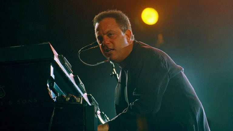 Billy Joel performs in concert at Busch Stadium in St....
