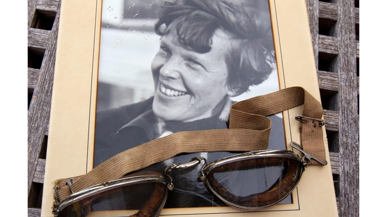An original, unpublished personal photo of Amelia Earhart dated 1937,...