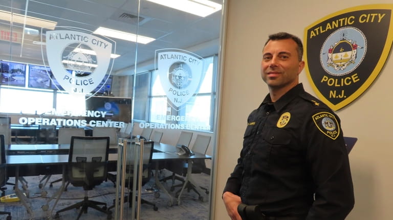 Police Chief James Sarkos, of Atlantic City, N.J., prepares to...