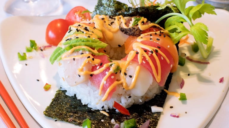 Popular sushi dishes like this "doughnut" were added to the...