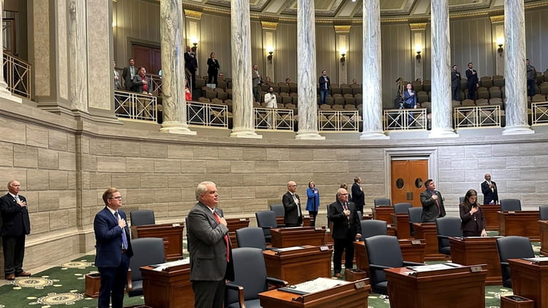 Missouri senators recite the Pledge of Allegiance as the chamber...