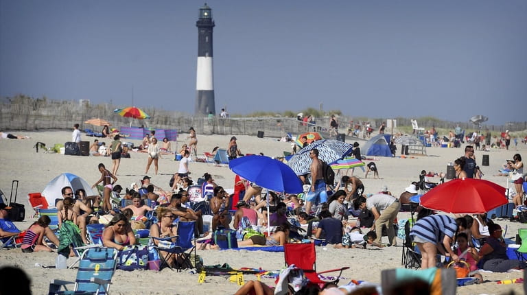 Crowds gather at the beach at Robert Moses State Park.