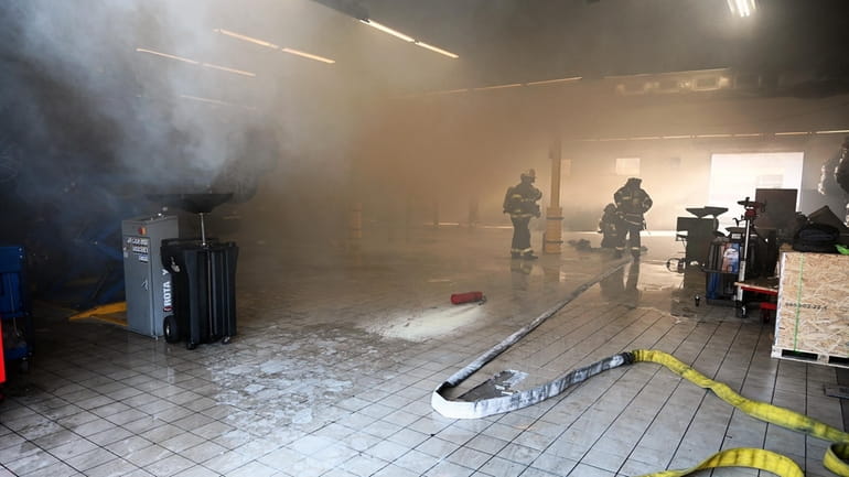The Westbury Fire Department responds to a fire at a...