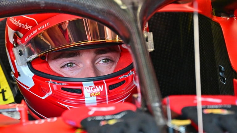 Monaco's Formula One driver Charles Leclerc of Ferrari prepares for...