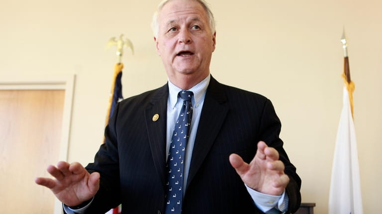 U.S. Rep. William Delahunt, D-Mass., faces reporters during a news...