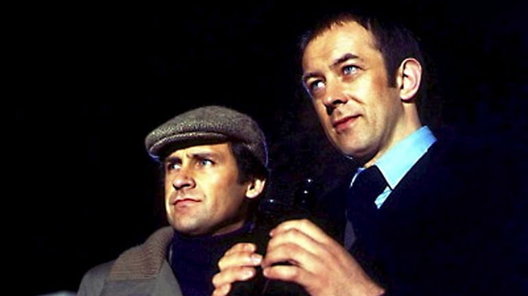 Willie Caine, played by Ray Lonnen, and Neil Burnside, played...