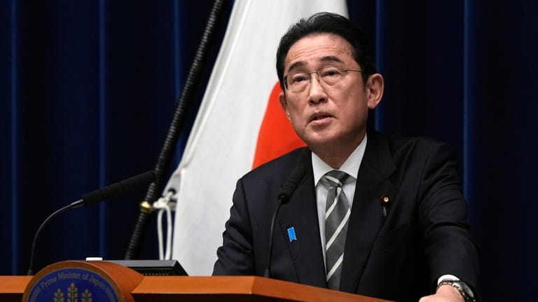 Japanese Prime Minister Fumio Kishida speaks during a news conference...