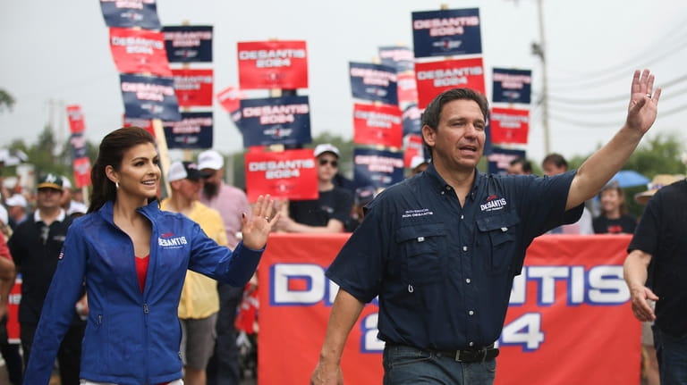 Republican presidential candidate and Florida Gov. Ron DeSantis and his...