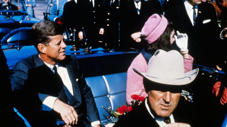 President John F Kennedy (left), First Lady Jacqueline Kennedy (in...