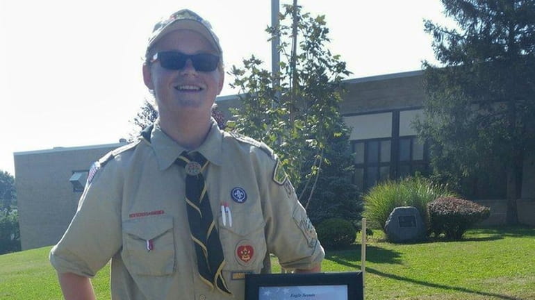 Boy Scout Jordan Waitkus installed pedestals with the names and...