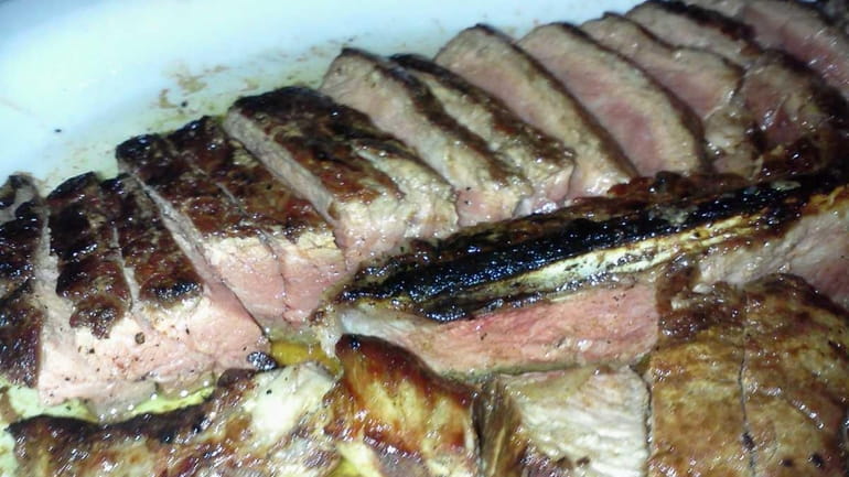 Porterhouse steak served on a plate at 420 North restaurant...
