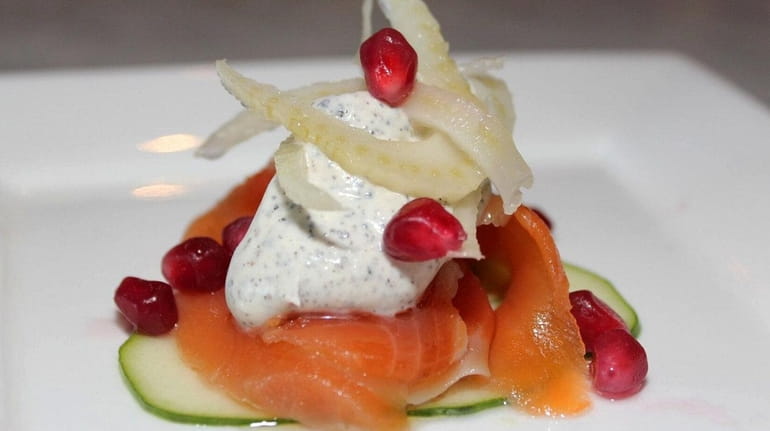 Grappa-cured salmon is dressed with cucumber, radish and chive cream...