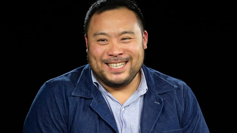 Chef David Chang speaks during an interview in Los Angeles...