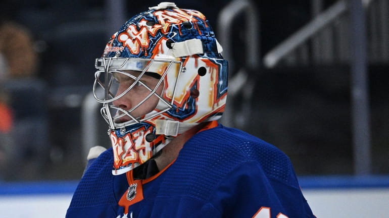 Semyon Varlamov of the New York Islanders defends against the