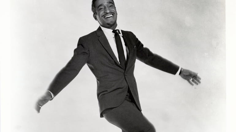 Sammy Davis, Jr. kicks it up in a photo from...