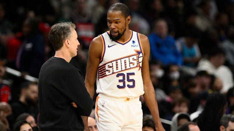 Phoenix Suns forward Kevin Durant (35) talks with Washington Wizards...