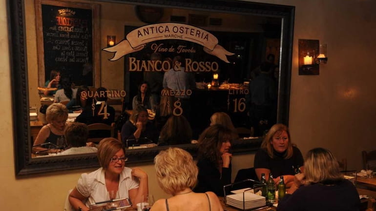 Patrons dine at Barrique Kitchen and Wine Bar in Babylon....