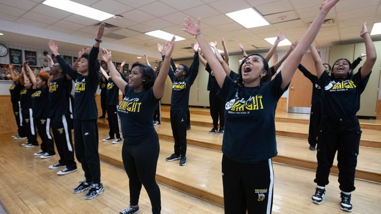 Students in the Uniondale High School Show Choir rehearse in...
