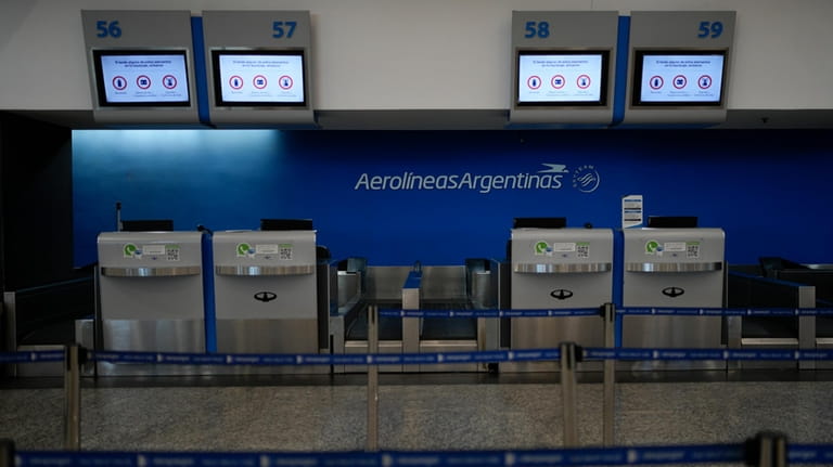 The Aerolíneas Argentinas counter is closed at Jorge Newbery International...