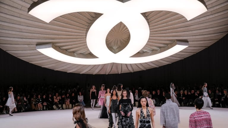 Models wear creations for Chanel as part of the Haute...