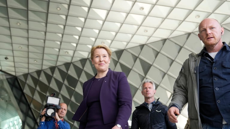 Franziska Giffey, center left, Berlin's top economic official leaves an...
