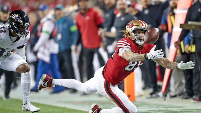 San Francisco 49ers' George Kittle can't make a catch during...