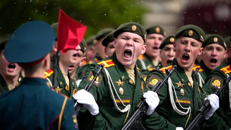 Russian servicemen march during the Victory Day military parade in...