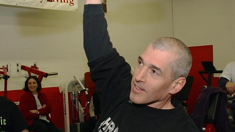 Ken Leistner in 2003 lifting weights, a sport he began as...